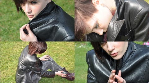 girl in forest wearing black leather gloves